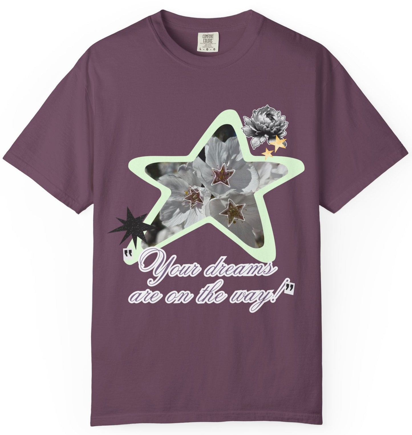 A purple crew neck t-shirt with a graphic print in the center, featuring a star and text that reads 'Your dreams are on the way, Loveworldllc, y2k aesthetic, affirmation shirt, colorful shirt, aesthetic ootd,dopamine dressing,dopamine fashion,cool shirt,unique tee, gifts for her,gifts for mom, mindfulness tee