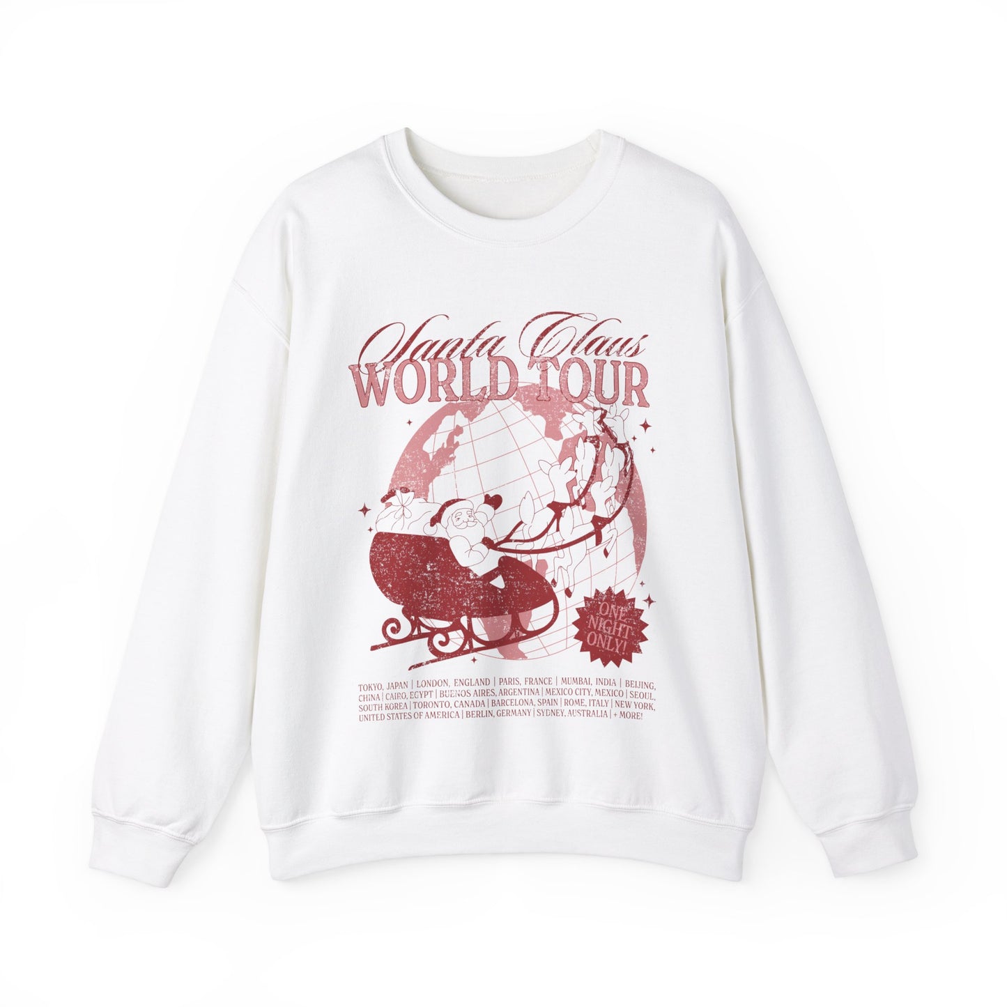 A white crewneck sweatshirt with a graphic print of Santa Claus and text 'Santa Claus World Tour' on the front.