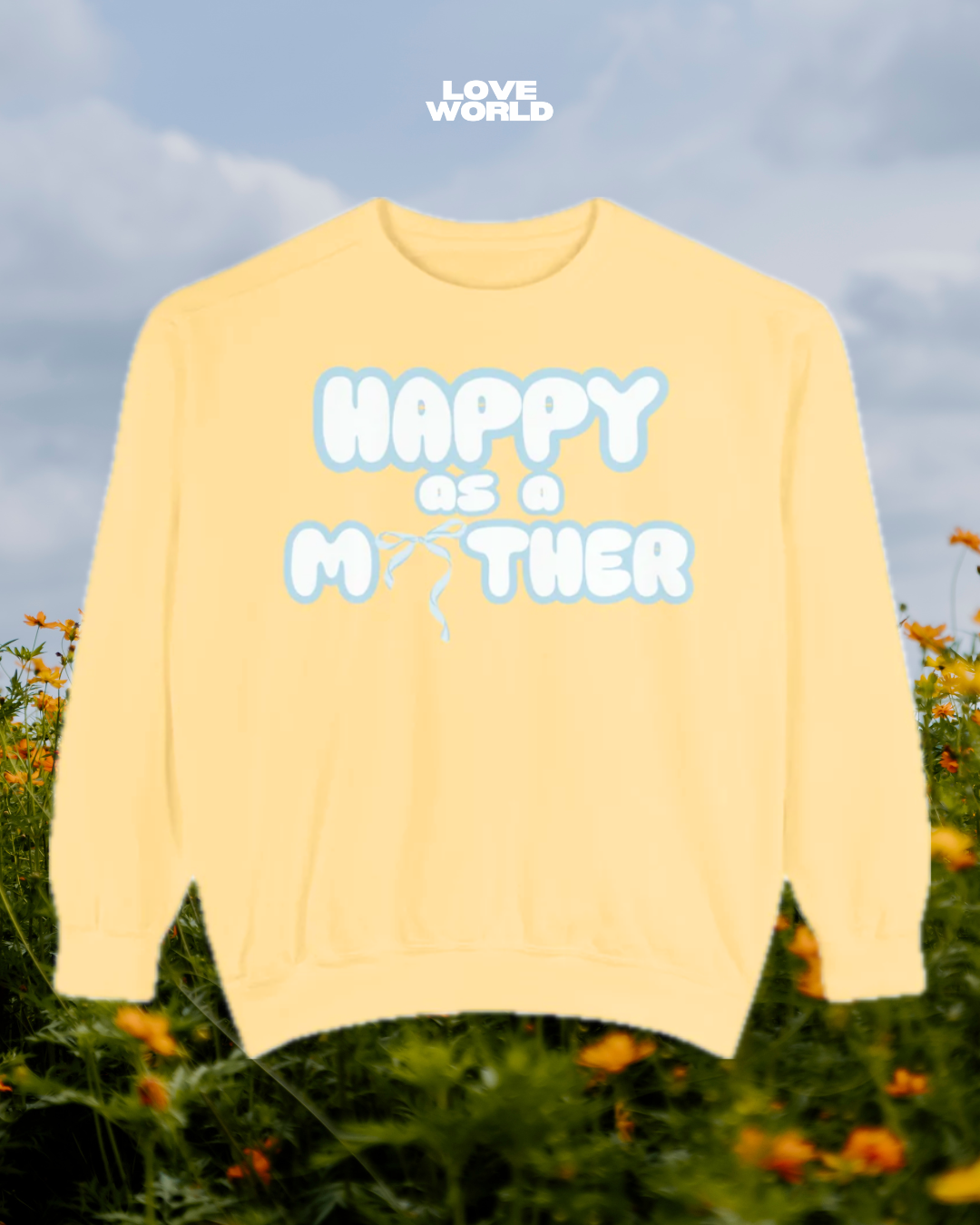A yellow crewneck t-shirt with the text 'HAPPY AS A MOTHER' printed in blue. Aura hoodie, manifest hoodie, affirmation hoodie, Unique vintage shirt,pastel shirt, spring fashion,summer fashion, Loveworldllc,Loveworldllc.com, mental health brand, mom brand, angel numbers,inner peace hoodie, ,aesthetic outfit,comfy mother graphic tee, graphic designer, unique fashion, clothing brand, Pinterest outfit, self Love brand, mom brand,gifts for her, gifts for mom